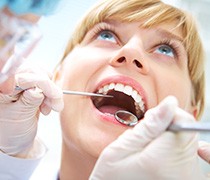 Woman receiving dental checkup