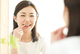 Woman looking at her whitened smile