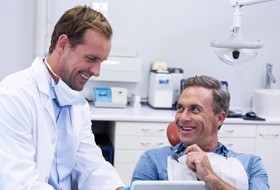 Man smiling at the dentist