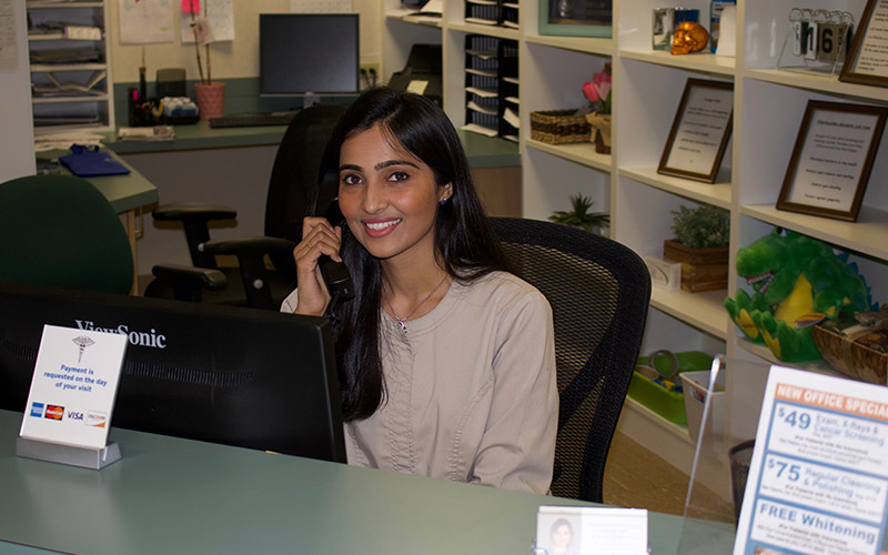 Team member at reception desk