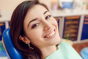 Smiling woman in dental chair