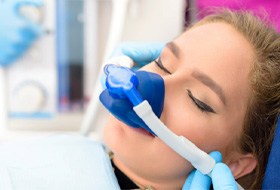 : A young woman receiving nitrous oxide sedation