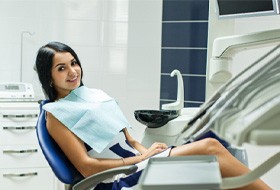A woman sitting in a dentist’s chair