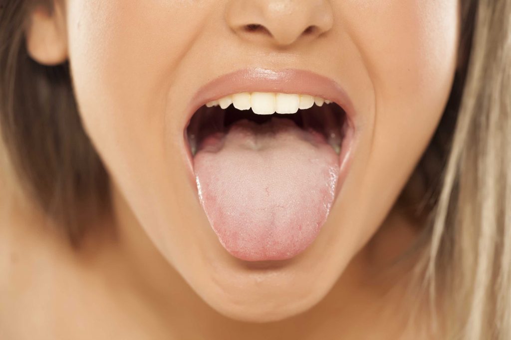 Tongue Scraping: What Is It And Should I Be Doing It?