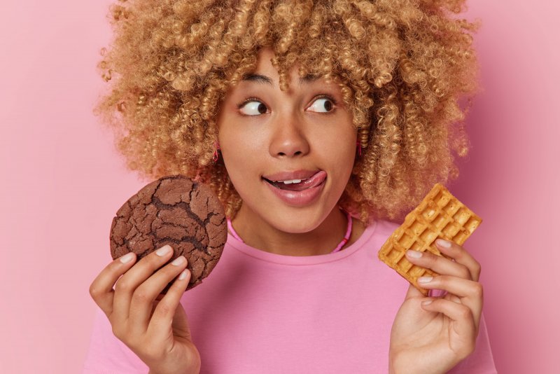 woman holding sweet treats in Wethersfield